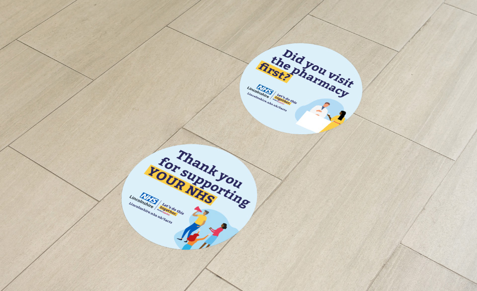 2 indoor campaign floor stickers with messages guiding viewers on how they can support their NHS.