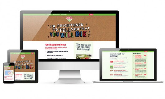 A computer, laptop, tablet and smartphone are all displaying the Quit for Them campaign website.